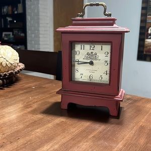 Small red antique style clock